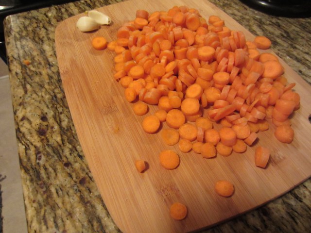 Chopped carrots with garlic cloves