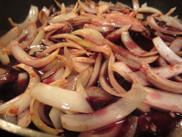 Onions cooking in wine